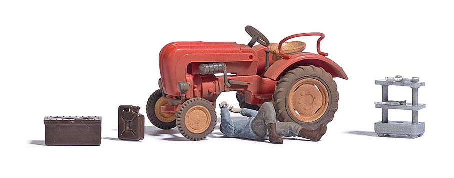 R&eacute;paration de tracteur avec m&eacute;canicien et accessoires HO 1/87 Busch 7937